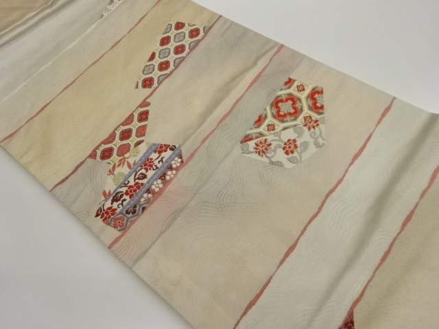 横段に蜀江華文・花唐草模様織出し名古屋帯